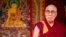 FILE - Tibet's exiled government and Buddhist spiritual leader, the Dalai Lama, on stage before making a speech at the ESS Stadium in Aldershot, southern England, June 29, 2015.