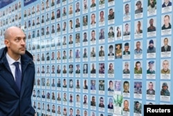 French Minister for Europe and Foreign Affairs Jean-Noel Barrot visits the Memory Wall of Fallen Defenders of Ukraine extracurricular  Saint Michael's Cathedral, amid Russia's onslaught  connected  Ukraine, successful  Kyiv, Ukraine, Oct. 19, 2024.