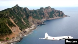 日本偵查機飛過尖閣列島（中國名：釣魚島）（資料圖片）