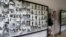 A tourist walks past photos of former prisoners displayed at Tuol Sleng genocide museum, a former Khmer Rouge prison known as S-21, in Phnom Penh.