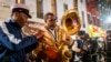 A band plays during a vigil on Bourbon Street for the victims of the Jan. terrorist attack in New Orleans, Louisiana, on Jan. 4, 2025. At least 15 people were killed and 30 injured when a vehicle plowed overnight into a New Year's crowd. 