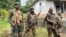 FILE: Armed Forces of the Democratic Republic of the Congo (FARDC) hold position following renewed fighting outside Goma in the North Kivu province of the Democratic Republic of Congo June 9, 2022. 