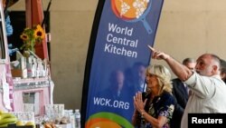 FILE - U.S. First Lady Jill Biden and Spanish chef José Andrés visit Pozuelo de Alarcon with Queen Letizia of Spain near Madrid, Spain, June 28, 2022 Greetings to the volunteers of the World Central Kitchen Association as they visit the reception center for Ukrainian refugees.
