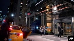 FILE - The Loews Regency Hotel is seen in New York, Monday, April 9, 2018. Federal agents raided the office of U.S. President Donald Trump's personal attorney Michael Cohen, seizing records on topics including a $130,000 payment made to porn actress Stormy Daniels. 
