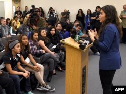 FILE - Actress America Ferrera talks to students at Rancho High School as she partners with Voto Latino to discuss the importance of young voters, including Latinos, participating in the civic process on February 11, 2016 in North Las Vegas, Nevada.