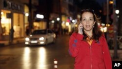 Dutch-Turkish journalist Ebru Umar talks on her mobile phone in Kusadasi, Turkey, April 25, 2016.