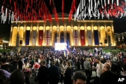 Demonstrators gather at the Parliamentary building during a protest against the foreign influence bill in Tbilisi, Georgia, on May 28, 2024. The Georgian parliament overrode a presidential veto of the legislation.