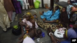 Victims of an army drone attack receive treatment at a hospital in Kaduna, Nigeria, on Dec. 5, 2023.