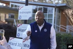 FILE - Democratic National Committee Chairman Jaime Harrison films a video encouraging people to vote in South Carolina's lead-off Democratic presidential primary on February 3, 2024, in Columbia, S.C