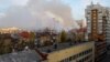 Smoke rises near a local railway administration headquarters damaged in shelling in the course of Russia-Ukraine conflict in Donetsk, Russian-controlled Ukraine, Nov. 7, 2022.