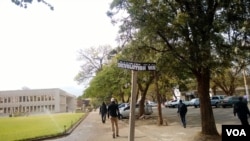 Defaced Robert Mugabe Way sign post in Bulawayo.