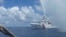 FILE - Chinese Coast Guard members approach Filipino fishermen as they confront each other off Scarborough Shoal in the South China Sea, also called the West Philippine Sea, Sept. 23, 2015.
