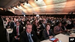 Morocco UN Climate Talks: Participants and delegates attend the opening session of the Climate Conference in Marrakech, Morocco, Monday Nov. 7, 2016. 