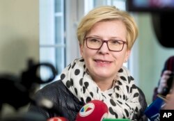 Former finance minister Ingrida Simonyte, a presidential candidate, speaks to the media at a polling station in presidential elections in Vilnius, Lithuania,, May 12, 2019.