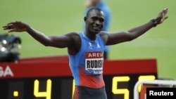 Kenya's David Rudisha celebrates after winning the men's 800 metres at the IAAF Diamond League athletics meeting, Saint-Denis, France, July 6, 2012.