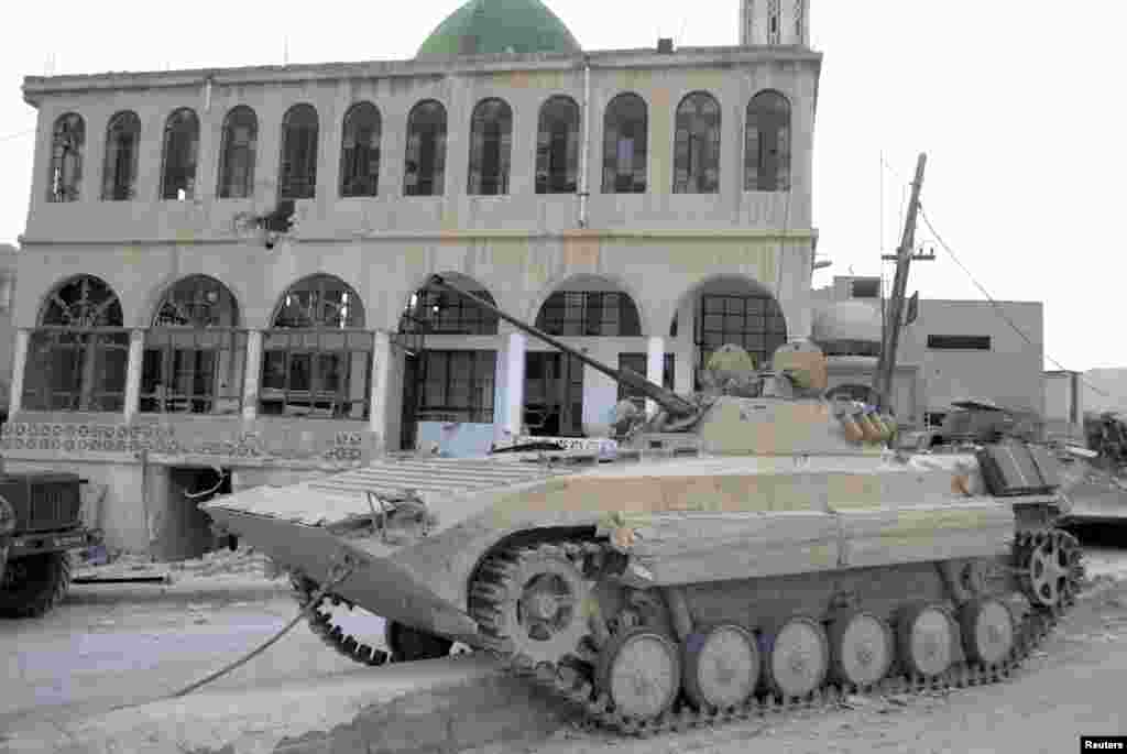 This SANA photo shows a Syrian government in Al-Sahl town, north of Yabroud, Syria, March 3, 2014. 