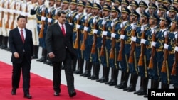 Ông Maduro trong chuyến thăm Trung Quốc hôm 14/9.