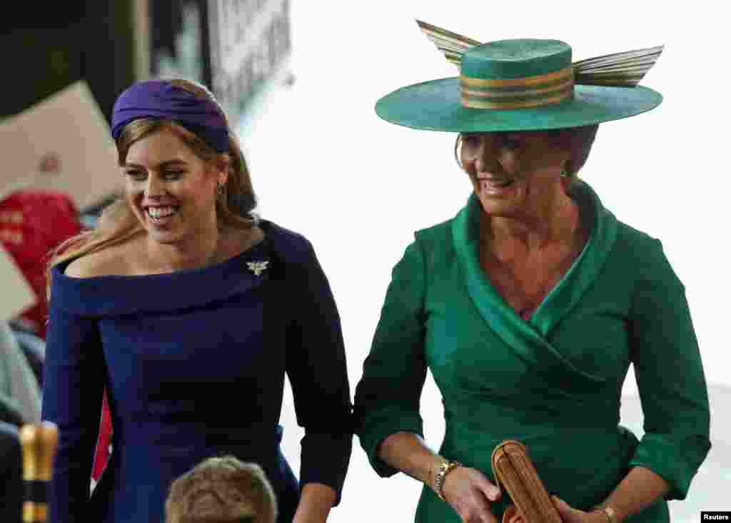 Princess Beatrice of York and Sarah, Duchess of York arrive at the wedding of Princess Eugenie to Jack Brooksbank at St George's Chapel in Windsor Castle, Britain, Oct.12, 2018. 
