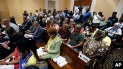 People fill the Jackson, Mississippi, City Council meeting, Oct. 1, 2019. The Council voted 3-1 to enact a local law limiting amplified sound outside health care facilities and creating buffer zones to move protesters further from the entrances.