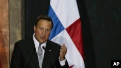 FILE - Panama's President Juan Carlos Varela speaks during a press conference in Mexico City, Mexico. Nov. 14, 2016.