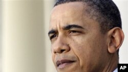 President Barack Obama makes a statement about Japan in the Rose Garden of the White House in Washington, March 17, 2011