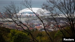A view of the Bolshoi Olympic stadium and accommodation complex in the Adler district of Sochi, Russia, Sep. 29, 2013. 