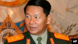 FILE - Laotian Defense Minister, Douangchay Phichit, is seen during a visit to Moscow.