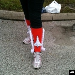 US Space shuttle fan sports her "shuttle socks" ahead of Atlantis launch at Kennedy Space Center in Florida, July 8, 2011