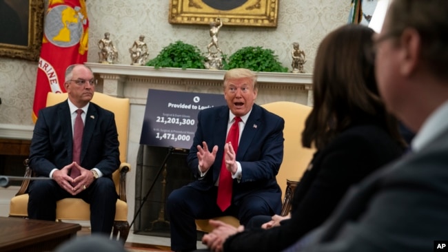 President Donald Trump speaks during a meeting about the coronavirus with Gov. John Bel Edwards, D-La., in the Oval Office of the White House, Wednesday, April 29, 2020, in Washington. (AP Photo/Evan Vucci)