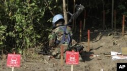 A Cambodian expert works to take out a land mine in Pailin province, a former Khmer Rouge stronghold in northwestern Cambodia.