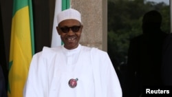 Le président Muhammadu Buhari reçoit l'ancien président John Mahama à Abuja, Nigeriale 9 janvier 2017. 