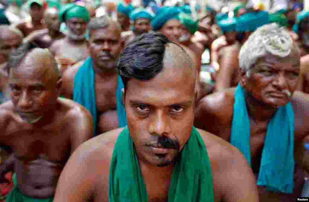 Farmers from the southern state of Tamil Nadu are seen half-shaved during a protest demanding a drought-relief package from the federal government, in New Delhi, India April 3, 2017.