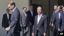 President Barack Obama, center, walks out with leaders of ASEAN, the 10-nation Association of Southeast Asian Nations, for the official group photo, Tuesday, Feb. 16, 2016, at the Annenberg Retreat at Sunnylands in Rancho Mirage, Calif. President Obama and leaders of Southeast Asia nations are wrapping up a two-day summit conceived to show U.S. seriousness about staying engaged and keeping a high profile in a region where a rising China has rattled American allies. (AP Photo/Pablo Martinez Monsivais)