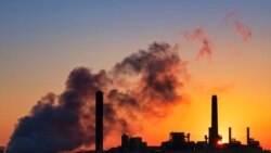 Dave Johnson coal-fired power plant is silhouetted against the morning sun in Glenrock, Wyo.