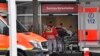 Paramedics work at the University Hospital in Duesseldorf, Germany, where a man who tested positive for the coronavirus is being treated, Feb. 26, 2020.