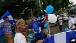 Manifestantes durante la 'marcha de las bombas' en Managua, Nicaragua, el 9 de septiembre del 2018. 