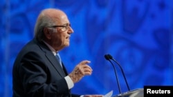 FILE - FIFA President Sepp Blatter addresses during the preliminary draw for the 2018 FIFA World Cup at Konstantin Palace in St. Petersburg, Russia July 25, 2015. 