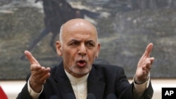 FILE - Afghan President Ashraf Ghani, speaks during, a press conference at the presidential palace in Kabul, Afghanistan.
