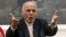 Afghan President Ashraf Ghani, speaks during, a press conference at the presidential palace in Kabul, Afghanistan.