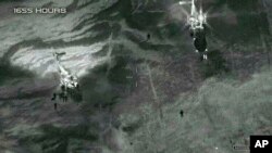 This image from video released by the Department of Defense, shows two French helicopters evacuating the U.S. service members in Niger in October 2017, after a ambush by Islamic State-linked militants.