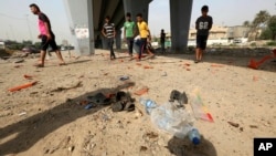 Một quả bom đặt trên xe hơi đang đỗ đã phát nổ ở một chợ rau quả đông người ở Baghdad.