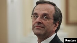 Perdana Menteri baru Yunani, Antonis Samaras di Istana Presiden di Athena (20/6).