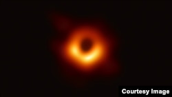 An image of the black hole at the center of Messier 87, a massive galaxy in the nearby Virgo galaxy cluster. This black hole resides 55 million light-years from Earth and has a mass 6.5-billion times that of the sun.