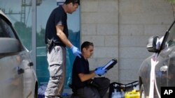 Israeli police investigates at the scene of an stabbing attack in the West Bank settlement of Gush Etzion, Sept. 15, 2018. 