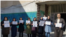 Iranian teachers join a nationwide teachers’ strike in the northwestern city of Marivan, March 4, 2019. They held protest signs calling for the release of detained teachers’ rights activists and for better working conditions. (Photo courtesy of CCTSI)