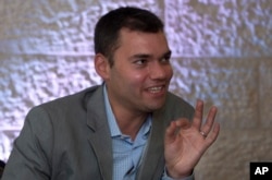 FILE - Prominent Jewish-American commentator Peter Beinart speaks during an interview with The Associated Press in Jerusalem, June 21, 2012.