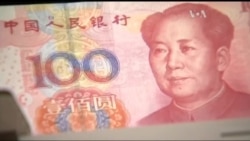 Аналітика: Чого чекати від здешевлення юаня? Відео