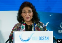 FILE - Indonesia Minister of Marine Affairs Susi Pudjiastuti speaks in Washington, Sept. 16, 2016. Pudjiastuti has been pushing to make illegal fishing a transnational crime since 2015.