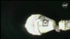 In this image from video provided by NASA, the unmanned Boeing Starliner capsule undocks as it pulls away from the International Space Station on Sept. 6, 2024. 