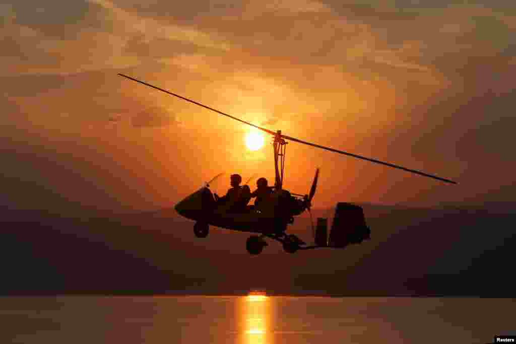 The Royal Aero Sports Club of Jordan plane known as a gyrocopter flies to provide tourists and visitors with a bird&#39;s eye view of the Dead Sea, Jordan, November 13, 2018.